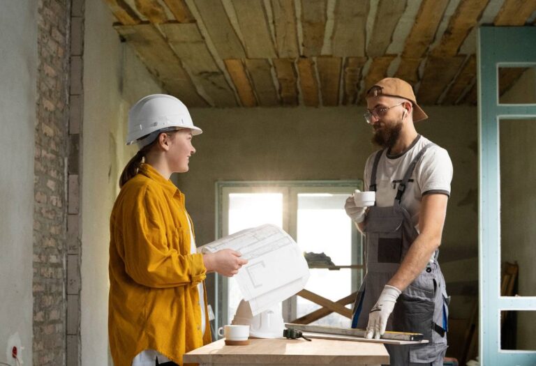 Tiler working on renovation of apartment